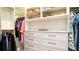 Walk-in closet with custom shelving and plenty of storage space at 531 68Th St, Holmes Beach, FL 34217
