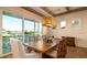 Dining room features a wooden dining table with water views at 531 68Th St, Holmes Beach, FL 34217