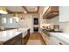 Modern kitchen features a farmhouse sink, stylish cabinets, and stainless steel appliances at 531 68Th St, Holmes Beach, FL 34217