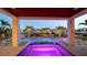 Beautifully designed pool area with covered lounge, fountains, and picturesque waterfront views at 531 68Th St, Holmes Beach, FL 34217