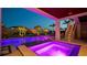 Inviting outdoor pool area with hot tub, fountains, and lush landscaping for ultimate relaxation and enjoyment at 531 68Th St, Holmes Beach, FL 34217