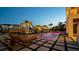 Inviting outdoor pool with lounge chairs and lights near palm trees in a waterfront setting at 531 68Th St, Holmes Beach, FL 34217