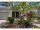 Charming front entrance with well-manicured landscaping and inviting curb appeal at 10642 Lake Montauk Dr, Riverview, FL 33578