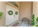 Elegant double front doors adorned with wreaths, creating a welcoming entryway at 11447 Adelia St, Spring Hill, FL 34608