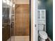 Updated bathroom with a glass shower, and toilet at 12654 Belcroft Dr, Riverview, FL 33579