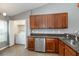 Well-equipped kitchen with stainless steel dishwasher and ample cabinet space at 12654 Belcroft Dr, Riverview, FL 33579