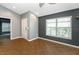 Inviting living room with tile floors, a large window, and neutral paint, creating a bright and open space at 12654 Belcroft Dr, Riverview, FL 33579