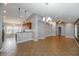Open living space with tile floors, neutral paint, and archways to other rooms at 12654 Belcroft Dr, Riverview, FL 33579