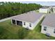 Aerial view of the backyard featuring the screened in porch at 15354 Sweet Springs Bnd, Odessa, FL 33556