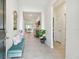 Bright entryway with tile flooring and views through to the living and dining areas at 15354 Sweet Springs Bnd, Odessa, FL 33556