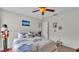 Tastefully decorated bedroom featuring a ceiling fan and comfortable furnishings at 2912 Aston Ave, Plant City, FL 33566