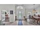 Bright and open foyer features soaring ceilings and an elegant front door at 2912 Aston Ave, Plant City, FL 33566