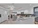 Spacious kitchen featuring a breakfast bar, stainless steel appliances, and ample counter space for food preparation at 2912 Aston Ave, Plant City, FL 33566