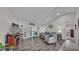 Spacious living room boasts wood-look vinyl flooring and natural light at 2912 Aston Ave, Plant City, FL 33566