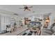 Open-concept living room showcasing a smooth transition to the dining area and kitchen, enhancing spaciousness and light at 2912 Aston Ave, Plant City, FL 33566