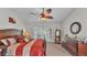 Bright and spacious main bedroom with ceiling fan and a large window offering ample natural light at 2912 Aston Ave, Plant City, FL 33566