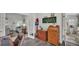 Cozy office space featuring luxury vinyl plank flooring and decorative items, including golf memorabilia at 2912 Aston Ave, Plant City, FL 33566