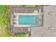 Aerial view of a stunning pool featuring an elegant design and surrounded by lush landscaping at 2912 Aston Ave, Plant City, FL 33566