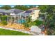 Private backyard featuring a screened pool, solar panels, and mature landscaping at 3620 Cordgrass Dr, Valrico, FL 33596