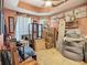 Spacious bedroom featuring carpet and a ceiling fan, needing some work at 3620 Cordgrass Dr, Valrico, FL 33596