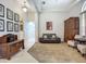 Well-lit foyer with decorative artwork and comfortable seating at 3620 Cordgrass Dr, Valrico, FL 33596