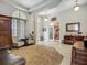 Grand foyer with soaring ceilings, arched doorways, and refined decor at 3620 Cordgrass Dr, Valrico, FL 33596