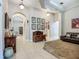 Spacious foyer with high ceilings, tile flooring, and elegant furnishings at 3620 Cordgrass Dr, Valrico, FL 33596