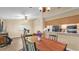 Open floor plan with dining area with access to bonus room and kitchen at 3715 Fortner Rd, Plant City, FL 33567