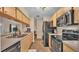 Well-equipped kitchen with stainless steel appliances and functional layout at 3715 Fortner Rd, Plant City, FL 33567