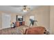 Living room with ample space, ceiling fan and room for treadmill and tv set at 3715 Fortner Rd, Plant City, FL 33567