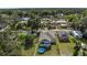 Spacious backyard featuring well-maintained lawn and an above-ground pool, perfect for outdoor entertainment at 5227 Lime Ave, Seffner, FL 33584