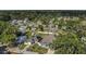 Aerial view of a neighborhood with a green tree canopy at 5227 Lime Ave, Seffner, FL 33584