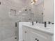 Stylish bathroom with a glass shower, double sink vanity, and modern fixtures, creating a serene and functional space at 5227 Lime Ave, Seffner, FL 33584