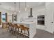 Bright kitchen featuring a large island, pendant lighting, and stainless steel appliances at 5227 Lime Ave, Seffner, FL 33584