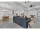 Open floor plan with spacious living room leading into modern kitchen at 5227 Lime Ave, Seffner, FL 33584