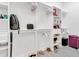 Organized walk-in closet featuring ample shelving, hanging space, and room for shoes and luggage at 5227 Lime Ave, Seffner, FL 33584