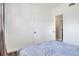 Cozy bedroom offers ample closet space and natural light; perfect for relaxation at 10804 N Leo St, Tampa, FL 33612