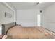 Serene bedroom features neutral tones, soft bedding, and is a perfect resting space at 10804 N Leo St, Tampa, FL 33612