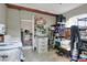 Organized storage room featuring shelves, drawers, and tile flooring for ample storage solutions at 10804 N Leo St, Tampa, FL 33612