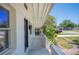 Inviting front porch with white brick accents and a black front door, perfect for welcoming guests at 6011 67Th N Ave, Pinellas Park, FL 33781