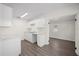 Bright kitchen features updated cabinets and countertops, with seamless flow into the adjacent room at 6011 67Th N Ave, Pinellas Park, FL 33781