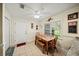Bright dining area features natural lighting and tile flooring at 9912 Pine Leaf Ln, Dade City, FL 33525