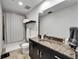 Bathroom featuring granite vanity and updated fixtures at 101 S 12Th St # 318, Tampa, FL 33602