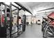 Modern gym with advanced equipment, including a punching bag, weight rack, and treadmills for a complete workout experience at 101 S 12Th St # 318, Tampa, FL 33602