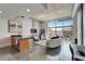 Open living area with modern design, concrete floors, and large windows with city views at 101 S 12Th St # 318, Tampa, FL 33602