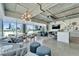 A modern living space with city views, an open layout, stylish furniture, and a sleek kitchen island at 101 S 12Th St # 318, Tampa, FL 33602