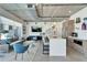 Modern living space with a sleek kitchen, comfortable seating, and city views through large windows at 101 S 12Th St # 318, Tampa, FL 33602