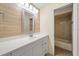 Well-maintained bathroom with modern sink and tile backsplash at 107 Seville N Ct, Plant City, FL 33566