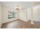 Dining room featuring tile floors, and modern light fixture at 107 Seville N Ct, Plant City, FL 33566
