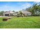 Charming single-story home with well-maintained landscaping and a lush green lawn at 107 Seville N Ct, Plant City, FL 33566